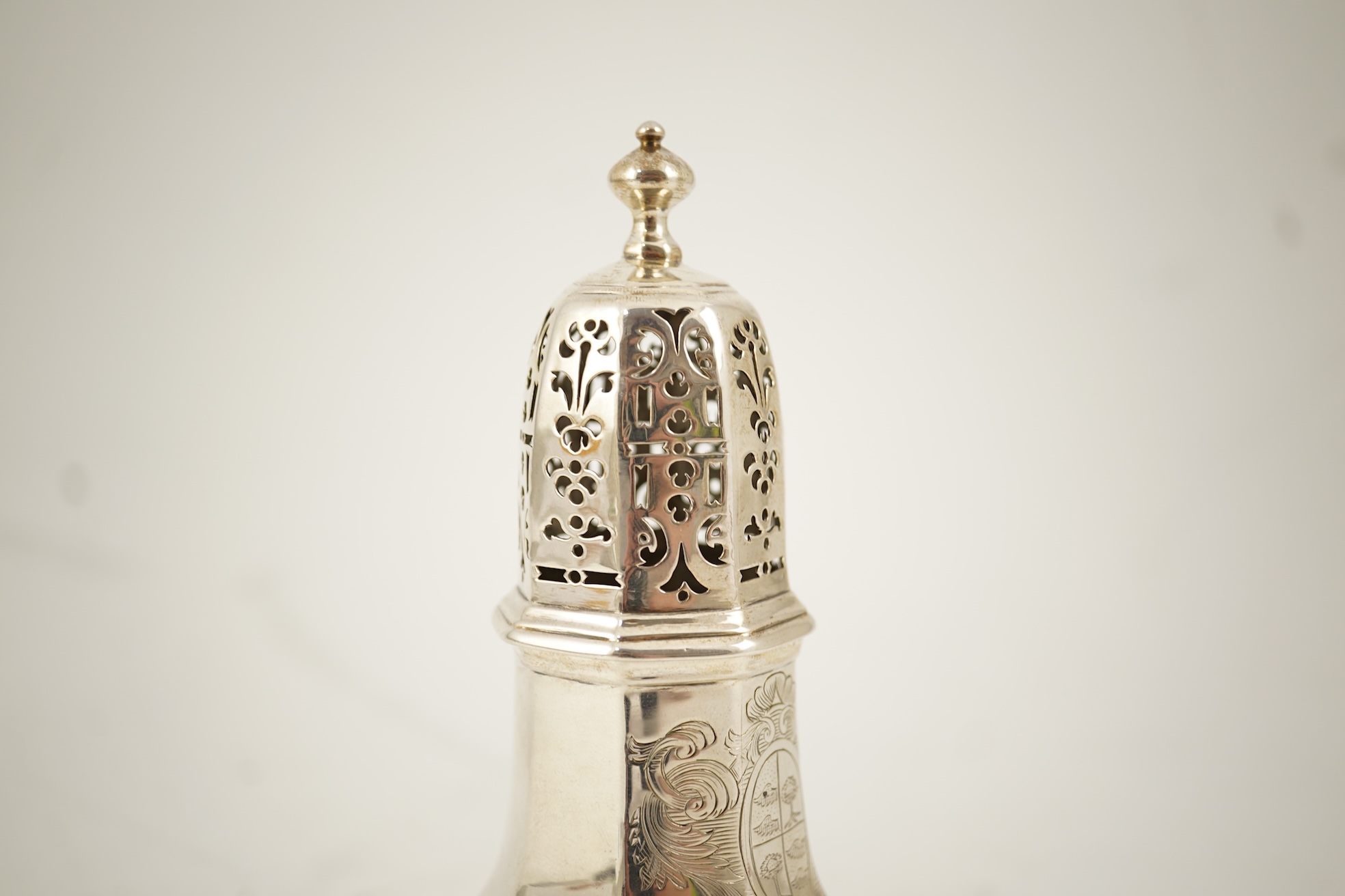 A late George I silver octagonal sugar caster, maker's mark overstruck by the date letter